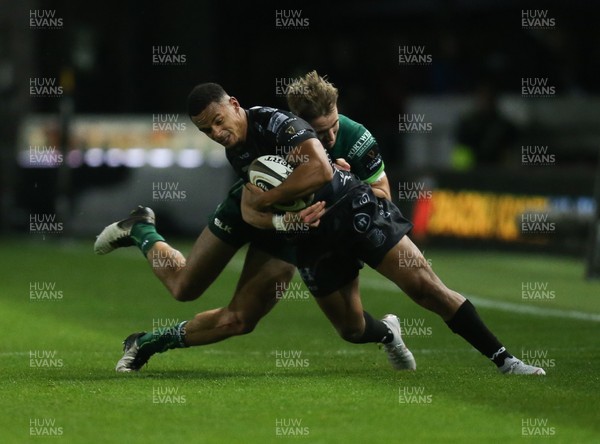 111019 - Dragons v Connacht, Guinness PRO14 - Ashton Hewitt of Dragons is tackled by John Porch of Connacht