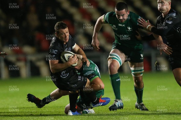 111019 - Dragons v Connacht, Guinness PRO14 - Adam Warren of Dragons is tackled