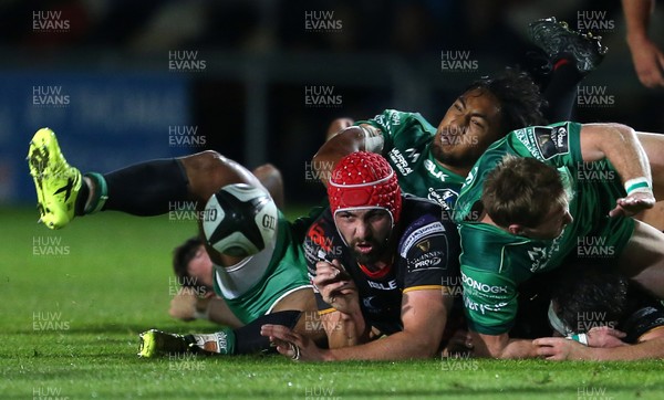 150917 - Dragons Rugby v Connacht - Guinness PRO14 - Cory Hill of Dragons goes for the ball on the floor