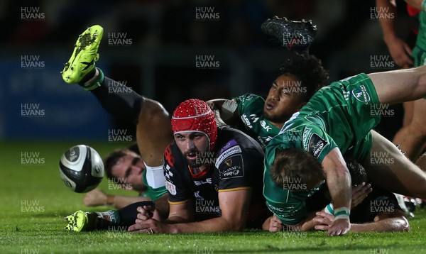 150917 - Dragons Rugby v Connacht - Guinness PRO14 - Cory Hill of Dragons goes for the ball on the floor