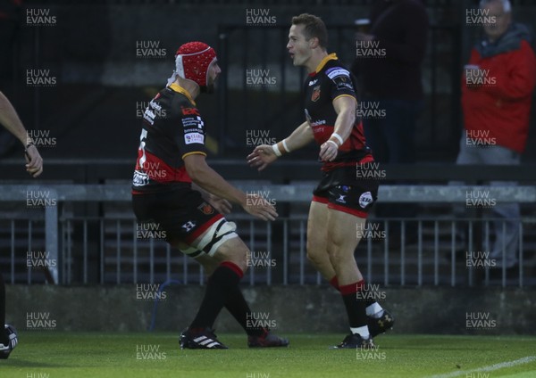 150917 - Dragons v Connacht, Guinness Pro14 - Hallam Amos of Dragons celebrates with Cory Hill of Dragons after he dives in to score try