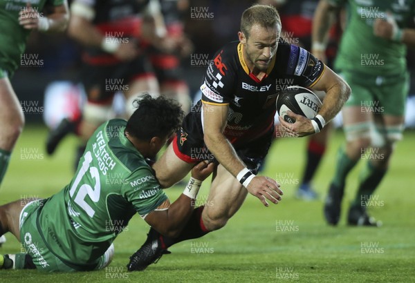 150917 - Dragons v Connacht, Guinness Pro14 - Sarel Pretorius of Dragons is tackled by Bundee Aki of Connacht