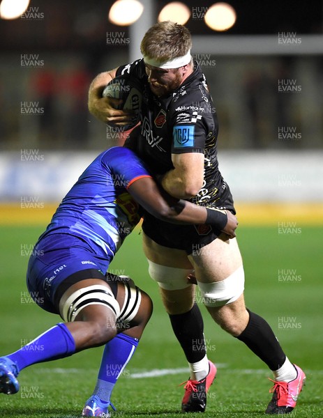 151021 - Dragons v DHL Stormers - United Rugby Championship - Aaron Wainwright of Dragons is tackled by Junior Pokomela of Stormers
