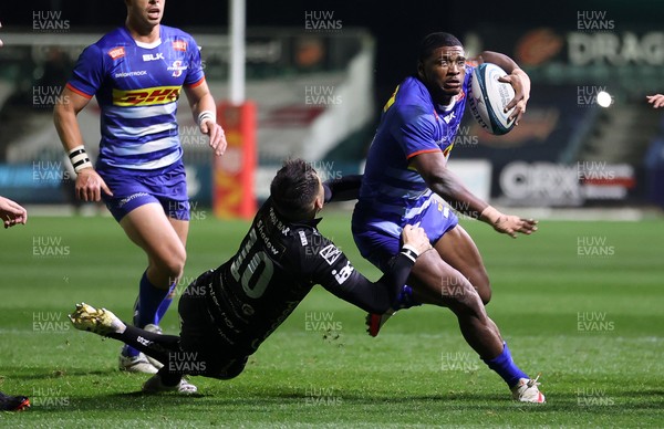 151021 - Dragons v DHL Stormers - United Rugby Championship - Warrick Gelant of Stormers is tackled by Sam Davies of Dragons