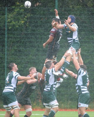 200816 - Dragons v Ealing Trailfinders - Ystrad MynachAshley Sweet of the Dragons goes for a lineout in the pouring rain at Ystrad Mynach