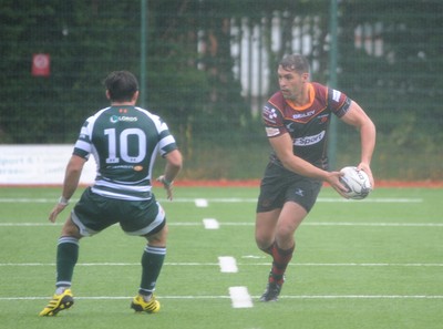 200816 - Dragons v Ealing Trailfinders - Ystrad MynachCharlie Davies of the Dragons looks for support