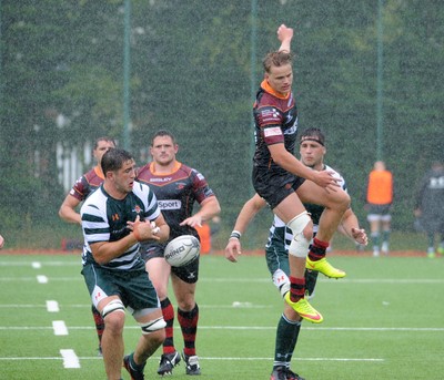 200816 - Dragons v Ealing Trailfinders - Ystrad MynachGeorge Gasson of the Dragons goes for a high ball