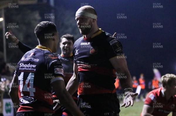 230218 - Dragons v Edinburgh Rugby, Guinness PRO14 - Rynard Landman of Dragons celebrates with Rio Dyer of Dragons after he scores his second try