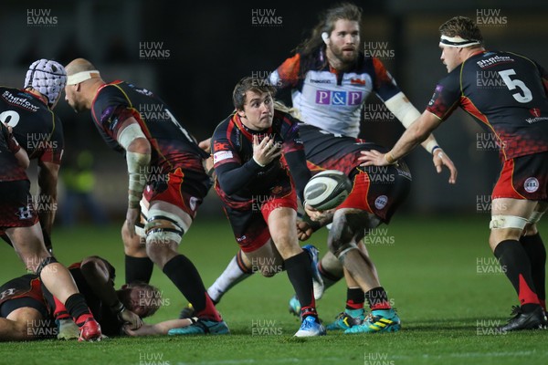 251118 - Dragons v Edinburgh Rugby, Guinness PRO14 - Rhodri Williams of Dragons feeds the ball out