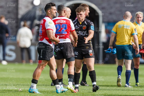 210522 - Dragons v Emirates Lions - United Rugby Championship - Will Reed of Dragons shakes hands with Manuel Rass of Emirates Lions at the end of the match