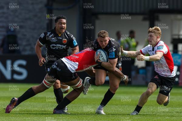 210522 - Dragons v Emirates Lions - United Rugby Championship - Elliot Dee of Dragons is tackled