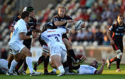 260816 - Newport-Gwent Dragons v Exeter Chiefs - Preseason Friendly -Sarel Pretorius of Dragons is tackled by Harry Williams of Exeter