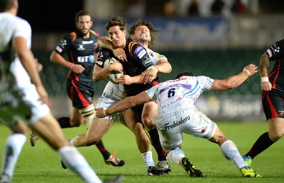 260816 - Newport-Gwent Dragons v Exeter Chiefs - Preseason Friendly -Sam Beard of Dragons is tackled by Alec Hepburn of Exeter