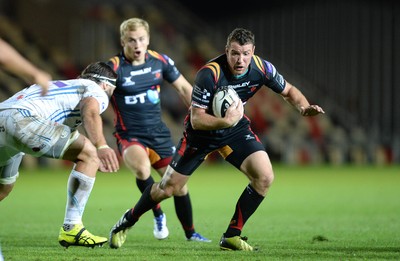 260816 - Newport-Gwent Dragons v Exeter Chiefs - Preseason Friendly -Adam Warren of Dragons looks for a way through