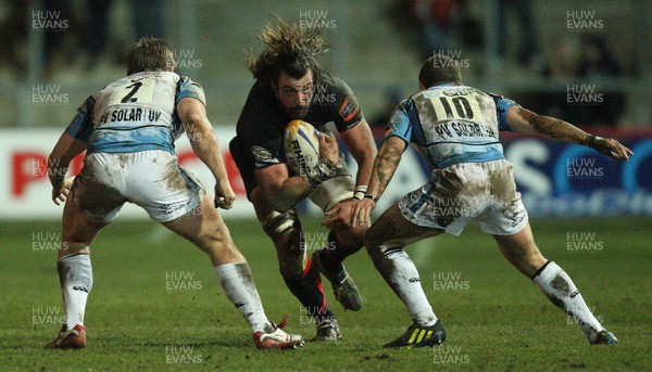 150213 - Newport Gwent Dragons v Glasgow, RaboDirect PRO12 - Dragons Ian Nimmo takes on Glasgow's Pat MacArthur and  Duncan Weir