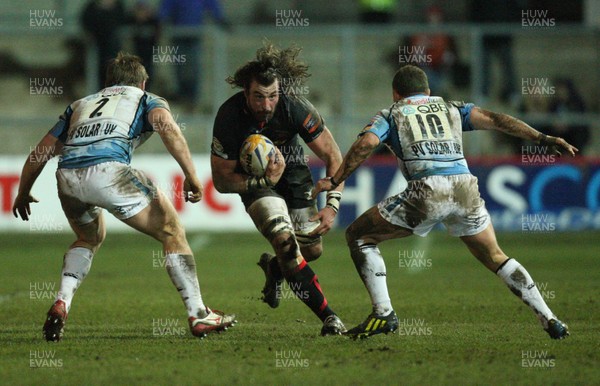 150213 - Newport Gwent Dragons v Glasgow, RaboDirect PRO12 - Dragons Ian Nimmo takes on Glasgow's Pat MacArthur and  Duncan Weir