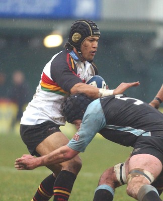 220105 - Newport Gwent Dragons v Glasgow - Celtic League - Dragons Sione Tuipulotu is tackled by Dan Turner