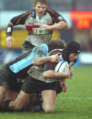 220105 - Newport Gwent Dragons v Glasgow - Celtic League - Dragons Hal Luscombe is tackled by Andy Craig