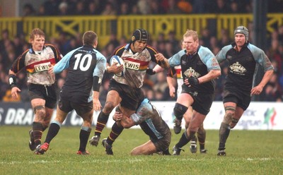 220105 - Newport Gwent Dragons v Glasgow - Celtic League - Dragons Sione Tuipulotu is tackled by Andrew henderson