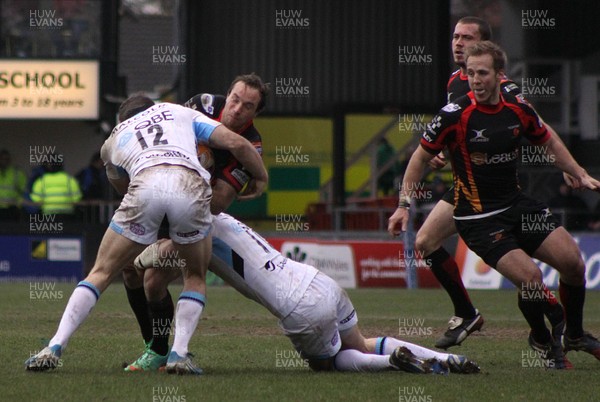 230214 - Newport Gwent Dragons v Glasgow Warriors - RaboDirect Pro 12 -Will Harries of Newport Gwent Dragons is tackled by Mark Bennett of Glasgow Warriors