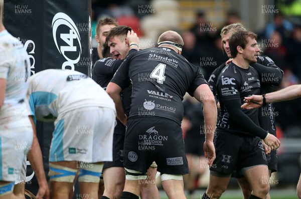 261019 - Dragons v Glasgow Warriors - Guinness PRO14 - Taine Basham of Dragons celebrates scoring a try with team mates