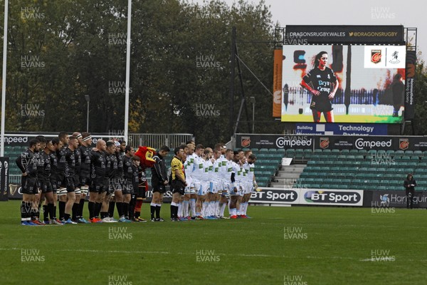 261019 - Dragons v Glasgow, Guinness Pro 14 - Both sides observe a minutes silence before the match in memory of Brooke Morris who had represented Dragons Women