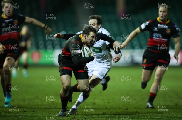 090218 - Dragons v Glasgow Warriors, Guinness PRO14 - Adam Warren of Dragons is tackled by Ruaridh Jackson of Glasgow Warriors