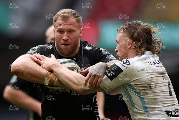 210321 - Dragons v Glasgow Warriors - Guinness PRO14 - Ross Moriarty of Dragons is tackled by Thomas Gordon of Glasgow
