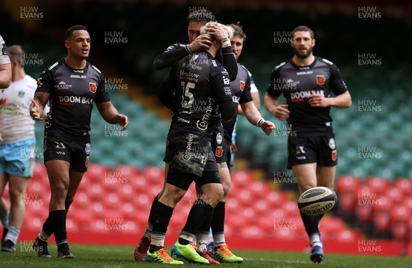 210321 - Dragons v Glasgow Warriors - Guinness PRO14 - Jordan Williams of Dragons celebrates scoring a try with team mates