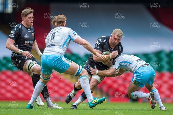 210321 - Dragons v Glasgow Warriors - Guinness PRO14 - Ross Moriarty of Dragons is tackled by Ross Thompson of Glasgow Warriors