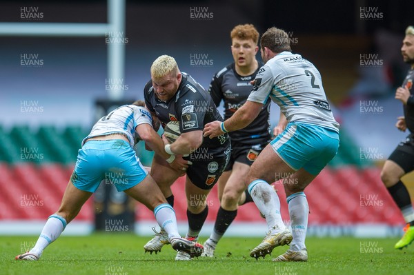 210321 - Dragons v Glasgow Warriors - Guinness PRO14 - Lloyd Fairbrother of Dragons is tackled by Ross Thompson of Glasgow Warriors and Fraser Brown of Glasgow Warriors