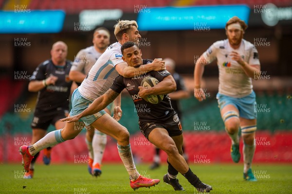 210321 - Dragons v Glasgow Warriors - Guinness PRO14 - Ashton Hewitt of Dragons is tackled by Adam Hastings of Glasgow Warriors