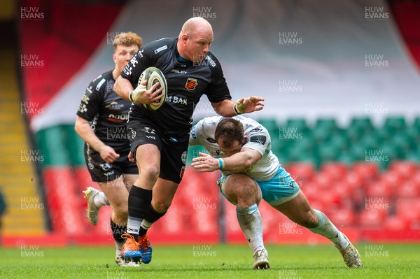 210321 - Dragons v Glasgow Warriors - Guinness PRO14 - Brok Harris of Dragons is tackled by Fraser Brown of Glasgow Warriors