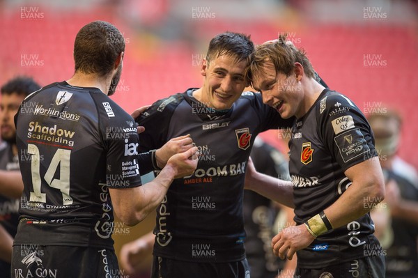 210321 - Dragons v Glasgow Warriors - Guinness PRO14 - Jonah Holmes of Dragons Sam Davies of Dragons and Nick Tompkins of Dragons celebrate at the final whistle