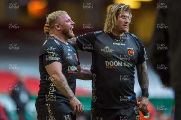 210321 - Dragons v Glasgow Warriors - Guinness PRO14 - Lloyd Fairbrother of Dragons and Richard Hibbard of Dragons celebrate their win