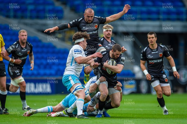 290521 - Dragons v Glasgow Warriors -  Guinness PRO14 Rainbow Cup - Jonah Holmes of Dragons is tackled by Ross Thompson of Glasgow Warriors