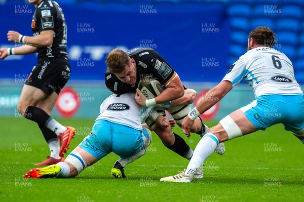 290521 - Dragons v Glasgow Warriors -  Guinness PRO14 Rainbow Cup - Matthew Screech of Dragons is tackled by Rory Darge of Glasgow Warriors
