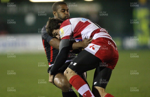 04.11.10..Newport Gwent Dragons v Gloucester, LV= Cup - Dragons Aled Brew is tackled by Jonny May 