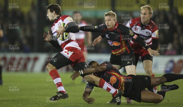 04.11.10..Newport Gwent Dragons v Gloucester, LV= Cup - Gloucesters Jonny May is tackled by Aled Brew 