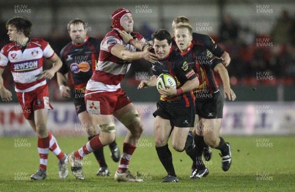 04.11.10..Newport Gwent Dragons v Gloucester, LV= Cup - Dragons Rhodri Gomer-Davies looks to break away 