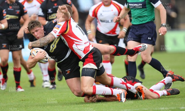 040812 - Newport Gwent Dragons v Gwent Select XV, Pre-season Friendly - Dragons Darren Waters takes on Gwent's Richard Powell and Gwent's Ross Wardle  