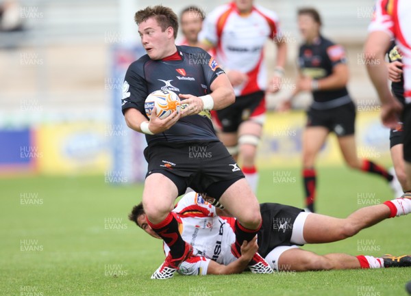 040812 - Newport Gwent Dragons v Gwent Select XV, Pre-season Friendly - Dragons Hugh Gustafson is tackled