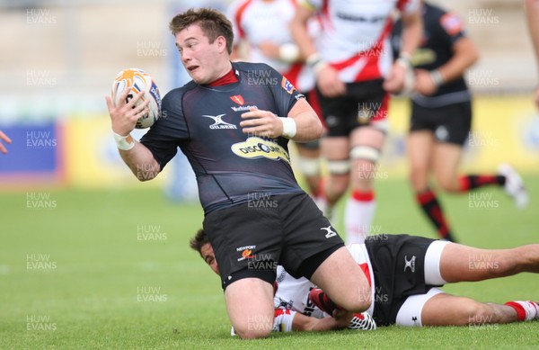 040812 - Newport Gwent Dragons v Gwent Select XV, Pre-season Friendly - Dragons Hugh Gustafson is tackled