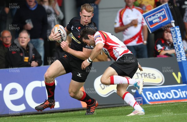 040812 - Newport Gwent Dragons v Gwent Select XV, Pre-season Friendly - Dragons Jack Dixon is tackled by Gwent's Elliot Frewen     