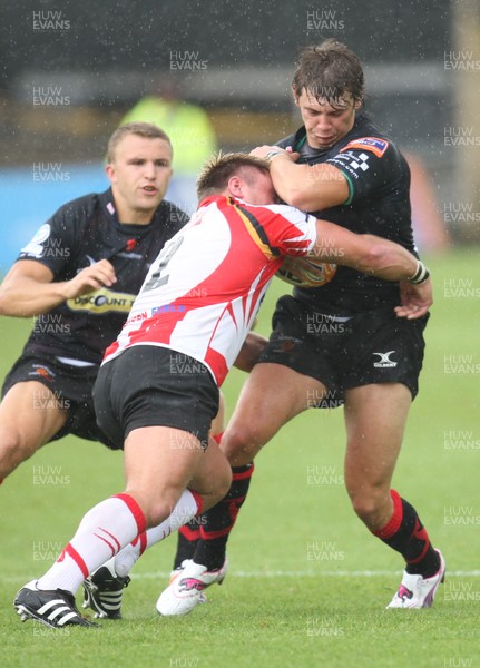 040812 - Newport Gwent Dragons v Gwent Select XV, Pre-season Friendly - Dragons Steffan Jones is stopped by Gwent's Gerwyn Price      