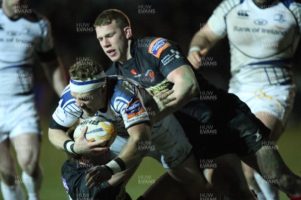 010313 - Newport Gwent Dragons v Leinster, RaboDirect PRO12 - Leinster's Ian Madigan is tackled by Dragons' Patrick Leach and Dragons' Jack Dixon 