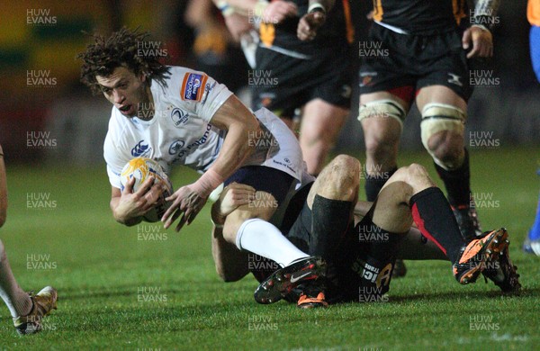 011113 - Newport Gwent Dragons v Leinster, RaboDirect PRO12 - Leinster's Zane Kirchner is tackled by Dragons Hallam Amos