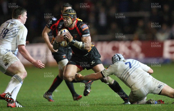 011113 - Newport Gwent Dragons v Leinster, RaboDirect PRO12 - Dragons Netani Talei charges into Leinster's Tadhg Furlong as Leinster's Shane Jennings tackles