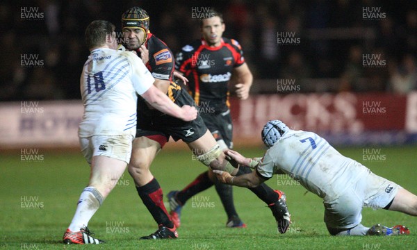 011113 - Newport Gwent Dragons v Leinster, RaboDirect PRO12 - Dragons Netani Talei charges into Leinster's Tadhg Furlong as Leinster's Shane Jennings tackles