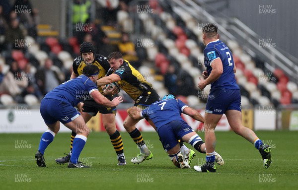 121123 - Dragons v Leinster - United Rugby Championship - Elliot Dee of Dragons is tackled by Will Connors of Leinster 